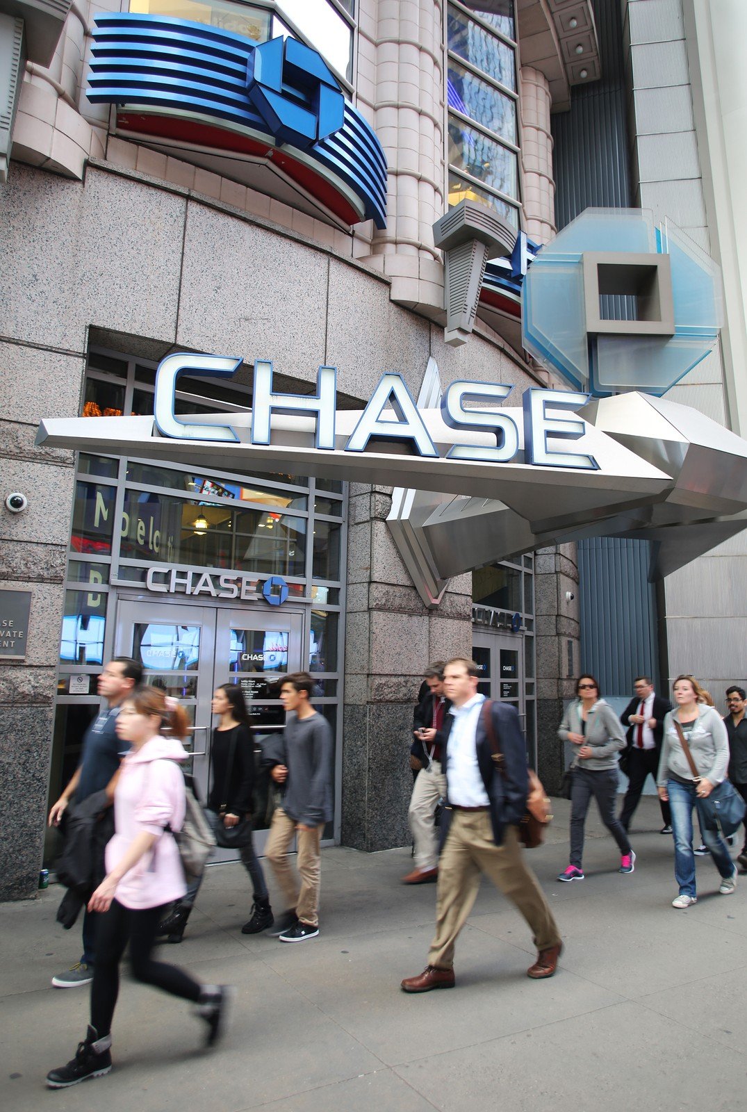 NEW YORK CITY - OCT 17: Pedestrians walk past an JP Morgan Chas JP Morgan Chase